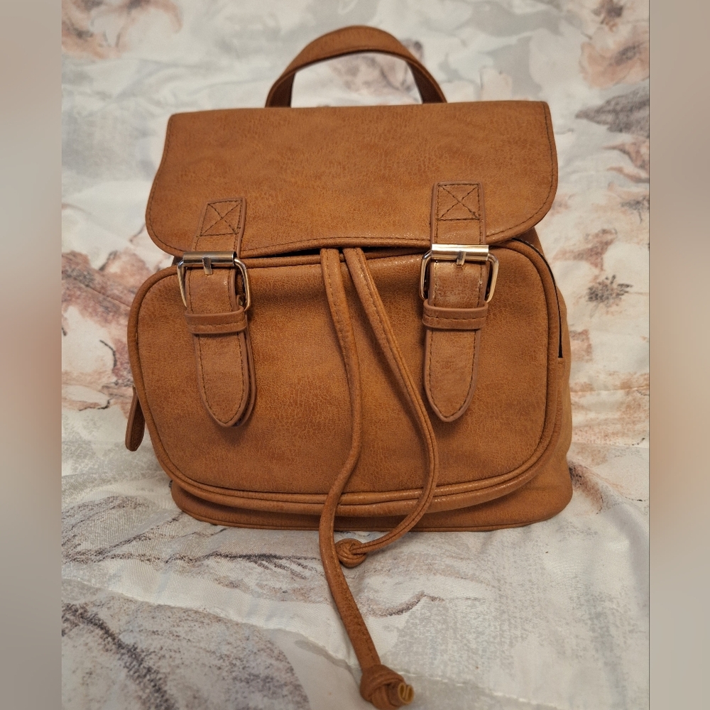 Atmosphere Tan Backpack Drawstring Ajustable Staps Front Zip Pocket